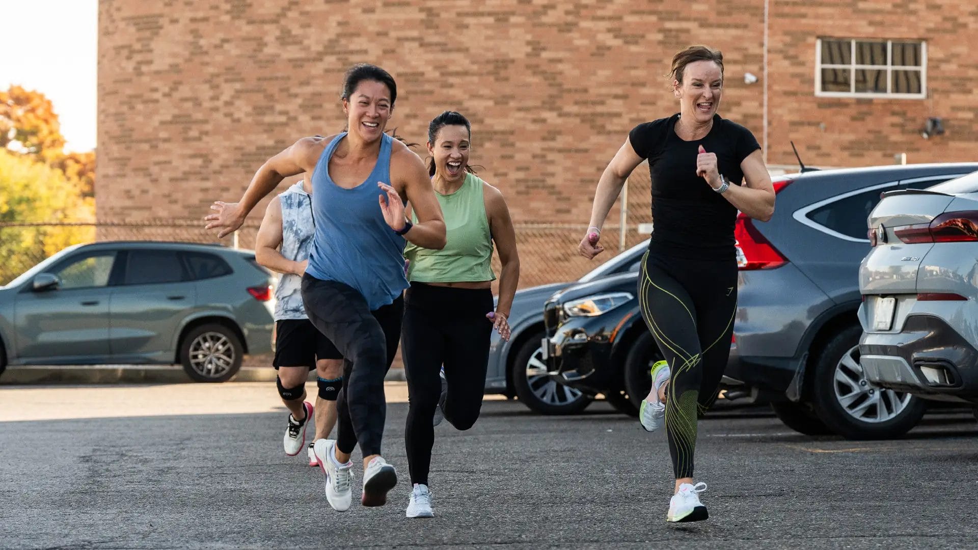 three girls run in CrossFit Gym in Markham